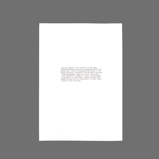 White paper with text on a gray background