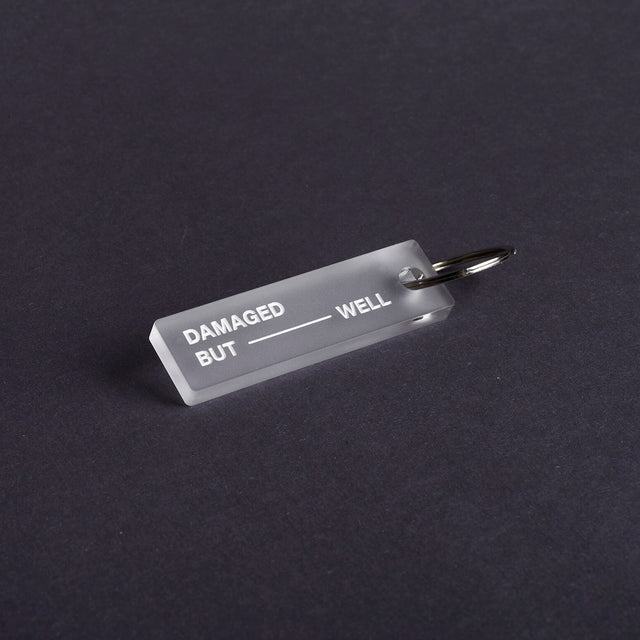 Damaged but well - small keytag